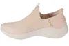 A side view of a beige Skechers slip-on sneaker. Voir les images du produit