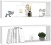Two white cube shelves are displayed against a white background, each containing decorative items and books. Produktbild-Vorschau