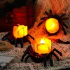 Sada 12 LED svíček ve tvaru pavouka jako halloweenská Náhled obrázku produktu 3