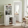 A white kitchen cabinet with glass doors and storage compartments, placed in a kitchen setting with a doorway leading to another room. Produktbild-Vorschau