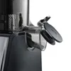 A close-up view of a juicer's pulp ejection spout and lid. Náhled obrázku produktu