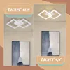 A collage showing a modern ceiling lamp in two different lighting conditions, with and without light, next to a framed abstract painting. Produktbild-Vorschau