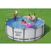 A family is enjoying a Bestway Steel Pro Max pool on a grassy lawn. Produktbild-Vorschau