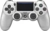 A silver PlayStation 4 Dualshock 4 V2 controller is shown from a front-facing, slightly elevated angle against a white background. Náhled obrázku produktu