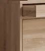 A close-up view of a wooden cabinet with an open drawer. Produktbild-Vorschau