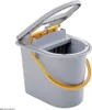 A gray mop bucket with a yellow handle and wringer mechanism is shown against a white background. Podgląd zdjęcia produktu