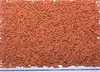 A pile of small, brown, cylindrical pellets, likely fish food, is shown from a top-down perspective. Produktbild-Vorschau