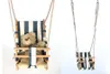 Babyschaukel Kinderschaukel aus Holz Stoff Schaukel zum Produktbild-Vorschau 3