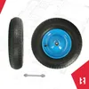 A wheelbarrow wheel and axle are shown against a blueprint-like background. Voir les images du produit