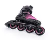 A pair of black and pink inline skates on a white background. Voir les images du produit