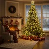 A cozy living room decorated for Christmas with a fireplace, stockings, a Christmas tree, and gifts. Produktbild-Vorschau