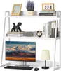 A white bookshelf organizer with various items on its shelves, including books, a picture frame, a plant, a clock, a radio, a computer monitor, a keyboard, a mouse, and a lamp. Podgląd zdjęcia produktu