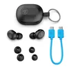 A flat lay of black JBuds Mini True Wireless Earbuds, their charging case, extra ear tips, and a blue USB-C charging cable. Anteprima dell’immagine prodotto