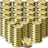 A collection of gold metal jar lids stacked in columns. Podgląd zdjęcia produktu