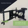 A black TV wall mount is shown attached to a white wall, with green arrows indicating movement and text overlays describing its features. Produktbild-Vorschau