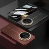 Two smartphone cases are displayed on a dark, angled surface. Produktbild-Vorschau