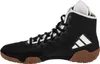 A side view of a black Adidas wrestling shoe with white accents and a brown sole. Produktbild-Vorschau