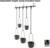 A black hanging planter system with five pots suspended by ropes from a horizontal bar, shown against a white background. Produktbild-Vorschau