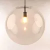 A clear, close-up shot of a glass pendant light. Produktbild-Vorschau