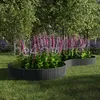 A garden bed with foxglove flowers and a curved border. Náhled obrázku produktu