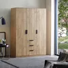 A wooden wardrobe with three doors and three drawers is shown in a room with a window and a chair. Anteprima dell’immagine prodotto