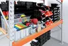 A storage rack filled with various transparent and black storage bins, some containing colorful items like gloves and cleaning supplies. Anteprima dell’immagine prodotto