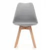 A light gray chair with wooden legs against a white background. Podgląd zdjęcia produktu