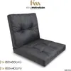 A dark gray lounge cushion set, consisting of a seat cushion and a backrest cushion, is displayed against a white background. The cushions have a tufted design. Produktbild-Vorschau