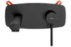 A black wall-mounted faucet with orange accents. Produktbild-Vorschau