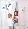 A mother and daughter are playing in a sensory swing indoors. Produktbild-Vorschau