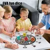 A family playing a board game with large dice. Produktbild-Vorschau