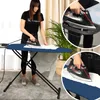 A woman is ironing on a large ironing board, with close-up shots of the iron and ironing board. Produktbild-Vorschau