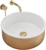 A gold and white washbasin with a gold faucet. Náhled obrázku produktu