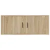 A front view of a light brown wooden TV cabinet with two doors and black handles, set against a white background. Voir les images du produit
