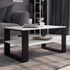 A modern living room scene with a coffee table as the focal point. Produktbild-Vorschau