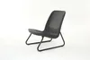 A black wicker chair with a metal frame on a white background. Náhľad obrázku produktu