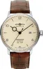 A close-up studio shot of a men's wristwatch with a cream-colored dial and a brown leather strap. Produktbild-Vorschau