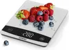 A digital kitchen scale with berries and water droplets on it. Produktbild-Vorschau