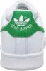 The back view of a white Adidas Stan Smith sneaker with a green heel tab featuring the Adidas logo and 'stan smith' text. Náhled obrázku produktu