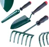 A set of three gardening tools: a trowel, a shovel, and a rake, arranged diagonally against a white background. Podgląd zdjęcia produktu