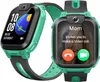 Two green and black smartwatches are displayed against a white background. One smartwatch is shown from the side, displaying the time and date. The other smartwatch is shown from the front, displaying an incoming video call from 'Mom'. Náhled obrázku produktu