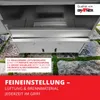Close-up view of the interior of a smoker, with text overlays describing features. Produktbild-Vorschau