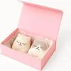 A pink gift box with two cat-shaped bath bombs inside. Náhled obrázku produktu