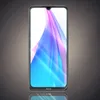 A smartphone with a colorful abstract wallpaper displayed on its screen, set against a dark, textured background with a reflection below. Produktbild-Vorschau