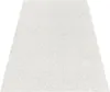 A close-up, angled view of a cream-colored carpet with a subtle texture, presented on a white background. Produktbild-Vorschau