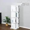 A white, multi-tiered rotating bookshelf is shown in a room with a plant and a wall. Podgląd zdjęcia produktu