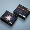 Two boxes of a product, one in the foreground and one in the background, on a light gray surface. Produktbild-Vorschau