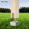 A wooden post is anchored to the ground with a metal bracket and a concrete base. Anteprima dell’immagine prodotto