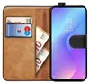 A book-style phone case with a credit card and euro banknotes inside, showing the phone screen. Náhled obrázku produktu
