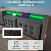 A bed with a headboard featuring integrated LED lighting and charging ports. Anteprima dell’immagine prodotto